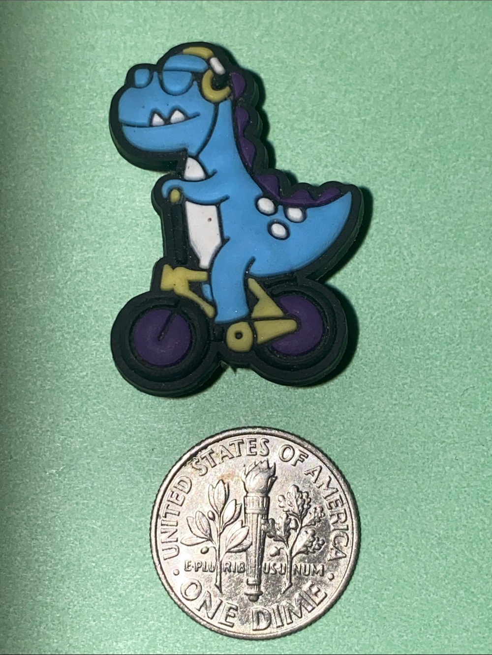 (10 for $15) T-Rex Dinosaur Riding a Bike w/ Glasses Crocs Shoes Charms